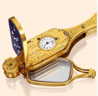 Antique gold-coloured mantel clock